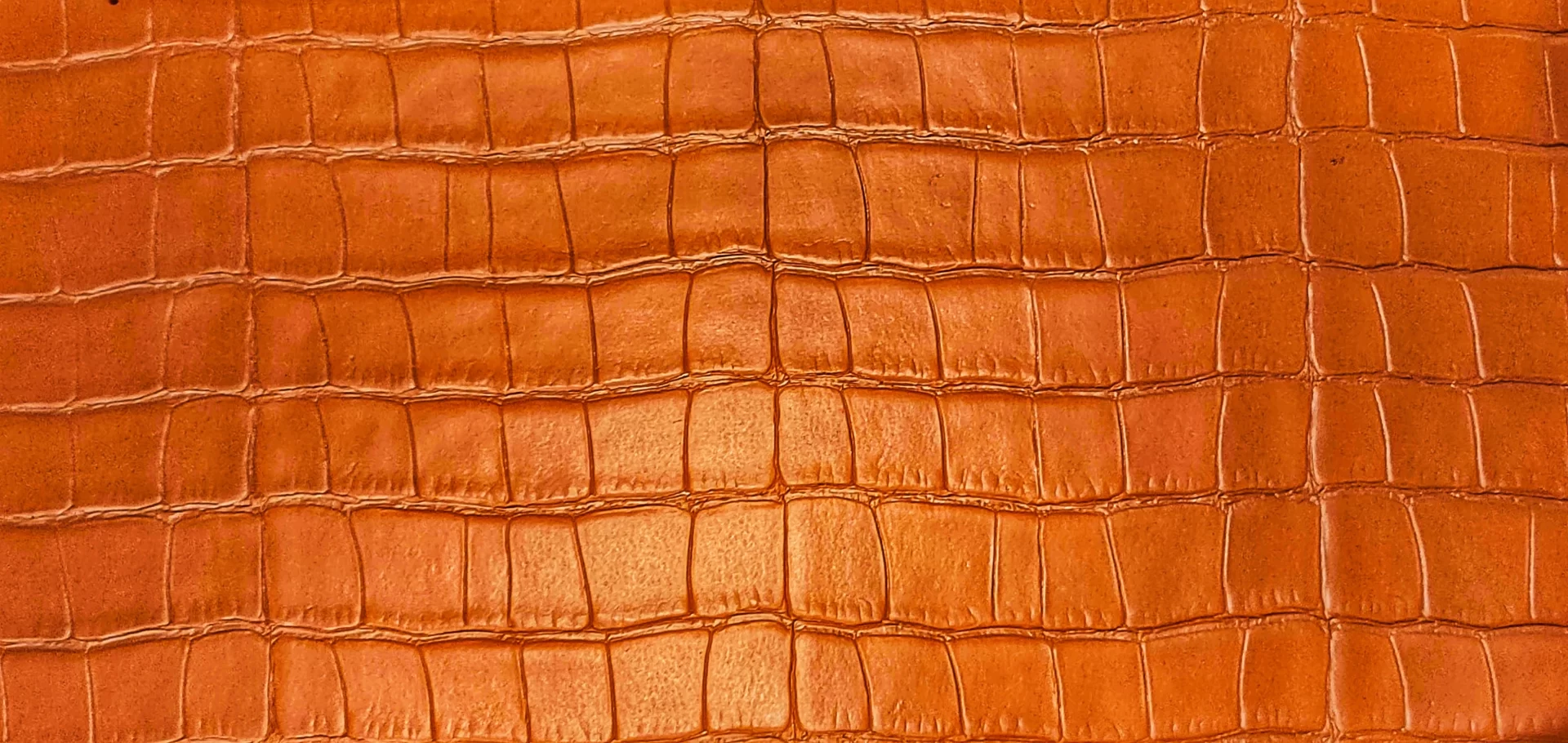 Close-up of a bronze leather pattern